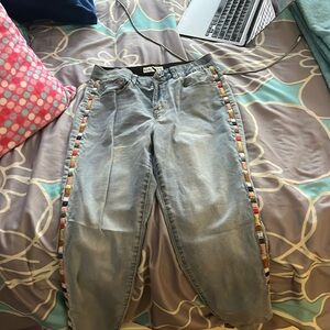 Skinny jeans with fun color strip on the side.